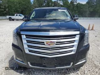 2016 Cadillac Escalade Platinum z VIN 1GYS4DKJ0GR165640, wystawiony jako Copart lot #52453805 z przebiegiem 103 086 mil mil oraz Szkoda całkowita • Salvage title. Historia ofert i sprzedaży dostępna na DreamBid. Obrazek 5.