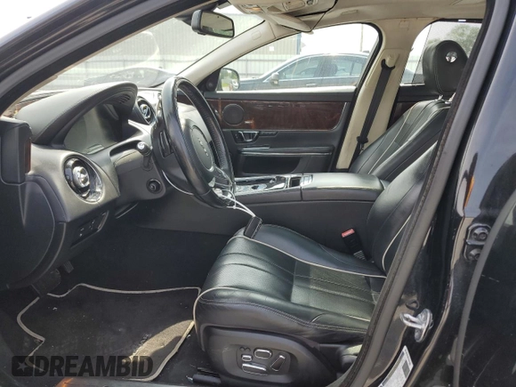2014 Jaguar XJ with VIN SAJWA2GZ7E8V60213, listed as a Copart auction lot 53382454 with 88,870 mi miles and Salvage Title. Bid and sale history available at carsss.com. Image 7.