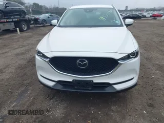 2021 Mazda CX-5 Touring with VIN JM3KFBCM1M1446313, listed as a IAAI auction lot 41930330 with 28,610 mi miles. Bid and sale history available at carsss.com. Image 12.