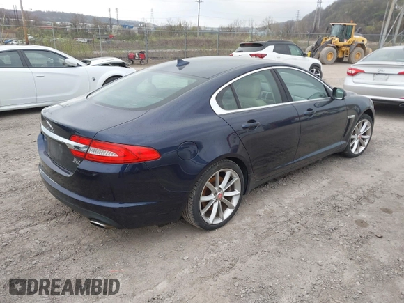 2015 Jaguar XF V6 Portfolio with VIN SAJWJ0FF5F8U67140, listed as a IAAI auction lot 41967522 with 68,000 mi miles. Bid and sale history available at carsss.com. Image 4.