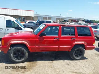 1999 Jeep Cherokee Sport with VIN 1J4FT68S1XL504294, listed as a IAAI auction lot 42509063 with 225,661 mi miles and . Bid and sale history available at DreamBid. Image 14.
