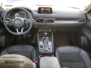 2020 Mazda CX-5 Touring with VIN JM3KFBCM9L0737243, listed as a Copart auction lot 46908495 with 76,956 mi miles and Salvage Title. Bid and sale history available at carsss.com. Image 8.