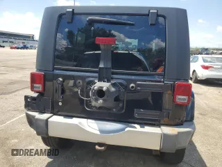 2008 Jeep Wrangler Unlimited Sahara with VIN 1J4GA59178L501668, listed as a Copart auction lot 63586375 with 213,562 mi miles and Clean title. Bid and sale history available at DreamBid. Image 6.