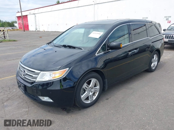2012 Honda Odyssey Touring with VIN 5FNRL5H93CB121190, listed as a IAAI auction lot 42223998 with 154,358 mi miles and . Bid and sale history available at DreamBid. Image 18.