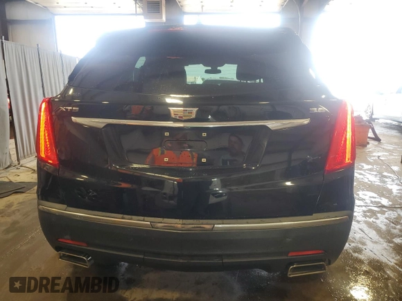 2017 Cadillac XT5 FWD with VIN 1GYKNARS0HZ257035, listed as a Copart auction lot 64284525 with 102,605 mi miles and Salvage title. Bid and sale history available at DreamBid. Image 6.