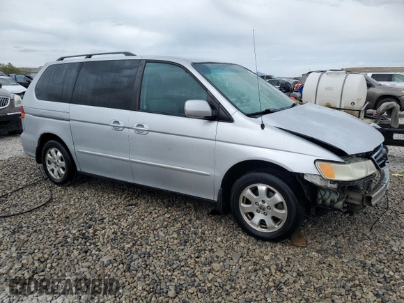 2004 Honda Odyssey EX-RES z VIN 5FNRL18804B121844, wystawiony jako Copart lot #53390135 z przebiegiem 284 065 mil mil oraz Szkoda całkowita • Salvage title. Historia ofert i sprzedaży dostępna na DreamBid. Obrazek 4.
