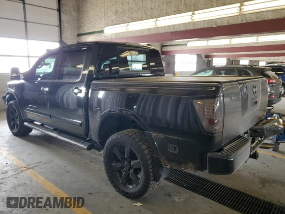 2011 Nissan Titan Pro-4X with VIN 1N6AA0EC5BN307980, listed as a Copart auction lot 42000295 with 168,335 mi miles and Salvage title. Bid and sale history available at DreamBid. Image 2.