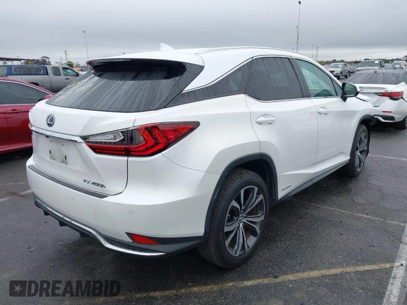 2020 Lexus RX with VIN 2T2HGMDA1LC052493, listed as a IAAI auction lot 41450535 with 63,547 mi miles. Bid and sale history available at carsss.com. Image 4.