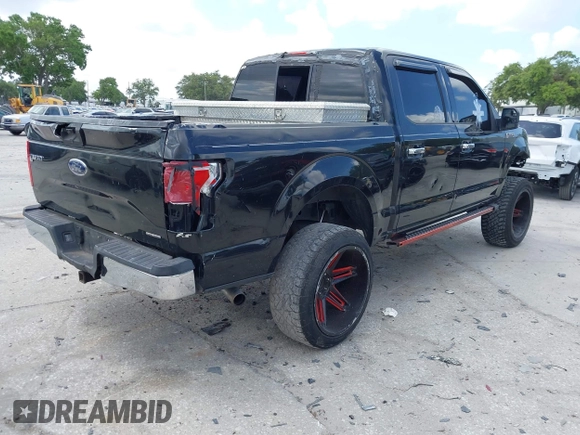 2015 Ford F-150 XLT with VIN 1FTEW1C81FFB05261, listed as a IAAI auction lot 42193554 with Not Provided miles and . Bid and sale history available at carsss.com. Image 4.