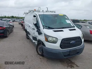 2016 Ford Transit Cargo with VIN 1FTYR1ZM5GKA09697, listed as a IAAI auction lot 41929098 with 98,790 mi miles and . Bid and sale history available at DreamBid. Image 1.