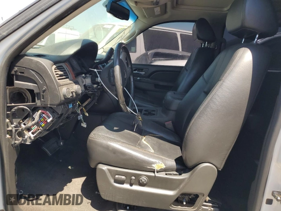 2014 Chevrolet Suburban LT with VIN 1GNSKJE79ER112840, listed as a Copart auction lot 64709074 with Not Provided miles and Salvage Title. Bid and sale history available at DreamBid. Image 7.
