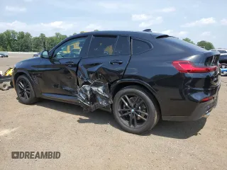 2021 BMW X4 xDrive30i with VIN 5UX2V1C09M9E03411, listed as a Copart auction lot 62078545 with 49,101 mi miles and Salvage title. Bid and sale history available at DreamBid. Image 2.