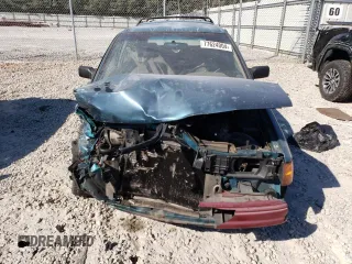 1995 Ford Escort z VIN 1FASP15J8SW308311, wystawiony jako Copart lot #77624004 z przebiegiem 345 777 mil mil oraz Szkoda całkowita • Salvage title. Historia ofert i sprzedaży dostępna na DreamBid. Obrazek 5.