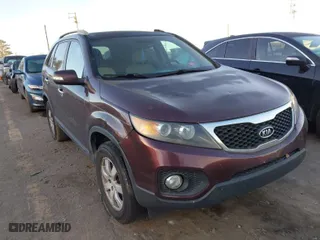 2011 Kia Sorento LX with VIN 5XYKT4A11BG139193, listed as a IAAI auction lot 41828090 with 217,298 mi miles. Bid and sale history available at carsss.com. Image 1.