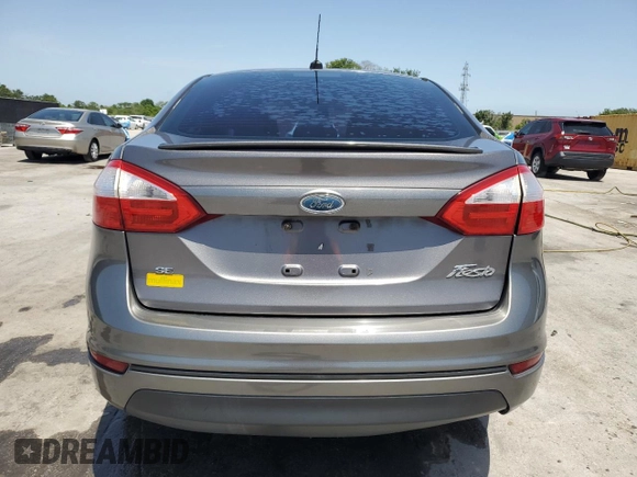 2014 Ford Fiesta SE z VIN 3FADP4BJ4EM110277, wystawiony jako Copart lot #56921115 z przebiegiem 126 536 mil mil oraz Szkoda całkowita • Salvage title. Historia ofert i sprzedaży dostępna na DreamBid. Obrazek 6.