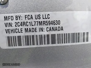 2021 Chrysler Pacifica Hybrid Touring L with VIN 2C4RC1L77MR594630, listed as a IAAI auction lot 41739229 with 79,556 mi miles. Bid and sale history available at carsss.com. Image 9.