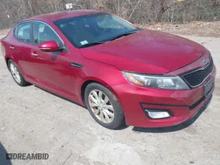 2014 Kia Optima LX with VIN 5XXGM4A77EG326177, listed as a IAAI auction lot 42088542 with 164,237 mi miles. Bid and sale history available at carsss.com. Image 1.