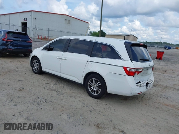 2011 Honda Odyssey EX-L with VIN 5FNRL5H67BB011070, listed as a IAAI auction lot 42491685 with 200,671 mi miles and . Bid and sale history available at DreamBid. Image 3.