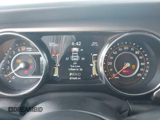 2020 Jeep Wrangler Unlimited Sport с VIN 1C4HJXDG4LW331133, выставлен на аукционе IAAI как лот 42154246 с пробегом 87 668 миль миль и . История ставок и продаж доступна на DreamBid. Изображение 7.