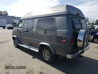 1994 Chevrolet Chevy Van z VIN 1GBEG25K5RF123489, wystawiony jako Copart lot #79491854 z przebiegiem 82 970 mil mil oraz Szkoda całkowita • Salvage title. Historia ofert i sprzedaży dostępna na DreamBid. Obrazek 2.