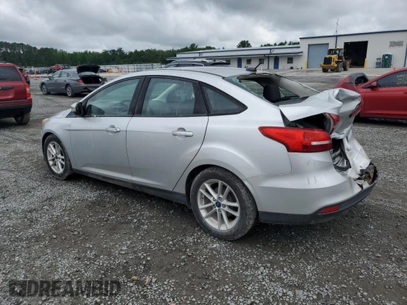 2016 Ford Focus SE with VIN 1FADP3F22GL402818, listed as a Copart auction lot 59500485 with 142,814 mi miles and Salvage title. Bid and sale history available at DreamBid. Image 2.