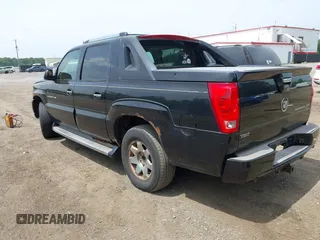 2004 Cadillac Escalade EXT z VIN 3GYEK62N54G290873, wystawiony jako IAAI lot #42411835 z przebiegiem 223 898 mil mil oraz . Historia ofert i sprzedaży dostępna na DreamBid. Obrazek 3.