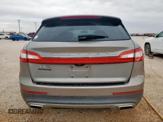 2017 Lincoln MKX Reserve z VIN 2LMPJ6LR6HBL30244, wystawiony jako Copart lot #56879745 z przebiegiem 98 771 mil mil oraz Czysty tytuł • Clean title. Historia ofert i sprzedaży dostępna na DreamBid. Obrazek 6.