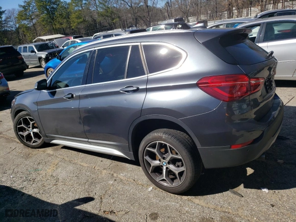 2018 BMW X1 xDrive28i with VIN WBXHT3C31J5K27206, listed as a Copart auction lot 45941755 with 99,777 mi miles and Salvage Title. Bid and sale history available at carsss.com. Image 2.