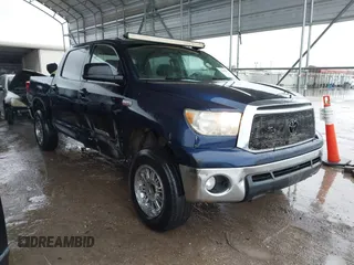 2010 Toyota Tundra with VIN 5TFEY5F17AX082748, listed as a IAAI auction lot 41300032 with 201,454 mi miles and . Bid and sale history available at DreamBid. Image 1.