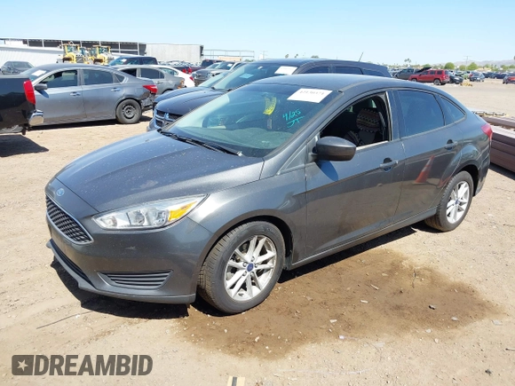 2018 Ford Focus SE with VIN 1FADP3FE6JL270910, listed as a IAAI auction lot 42130371 with 121,240 mi miles. Bid and sale history available at carsss.com. Image 17.