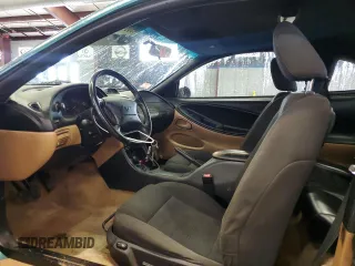 1996 Ford Mustang GT z VIN 1FALP42X5TF191769, wystawiony jako Copart lot #49364525 z przebiegiem 69 029 mil mil oraz Szkoda całkowita • Salvage title. Historia ofert i sprzedaży dostępna na DreamBid. Obrazek 7.