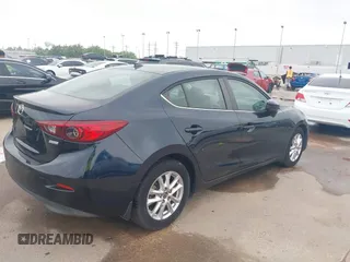 2016 Mazda Mazda3 i Grand Touring with VIN 3MZBM1X72GM237888, listed as a IAAI auction lot 41937237 with 93,454 mi miles. Bid and sale history available at carsss.com. Image 4.