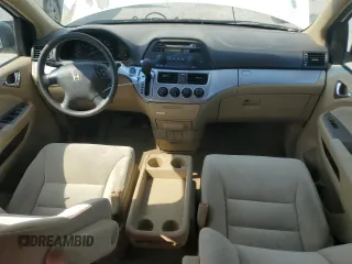 2009 Honda Odyssey LX with VIN 5FNRL38259B040742, listed as a Copart auction lot 59397975 with 161,562 mi miles and Clean title. Bid and sale history available at DreamBid. Image 8.