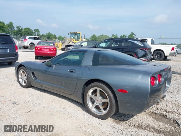 2004 Chevrolet Corvette with VIN 1G1YY22G745124026, listed as a IAAI auction lot 39673974 with 22,415 mi miles and . Bid and sale history available at DreamBid. Image 3.