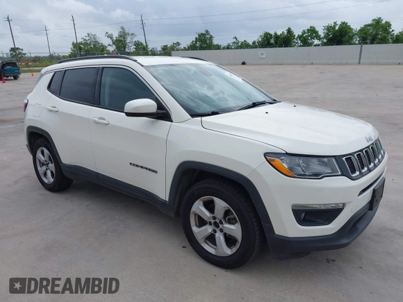 2019 Jeep Compass Latitude with VIN 3C4NJCBB9KT652088, listed as a IAAI auction lot 42162439 with 97,276 mi miles and . Bid and sale history available at DreamBid. Image 1.