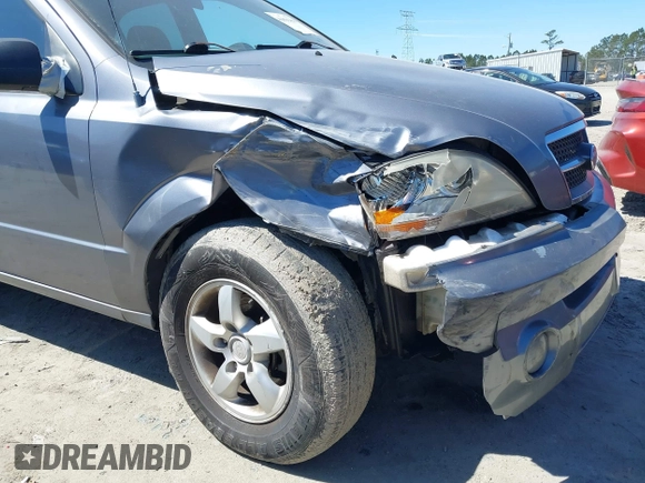 2006 Kia Sorento LX with VIN KNDJD733965596468, listed as a IAAI auction lot 41854438 with 205,028 mi miles and . Bid and sale history available at DreamBid. Image 6.
