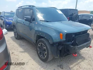 2016 Jeep Renegade Trailhawk with VIN ZACCJBCT1GPE10015, listed as a IAAI auction lot 42572522 with 131,631 mi miles and . Bid and sale history available at DreamBid. Image 1.