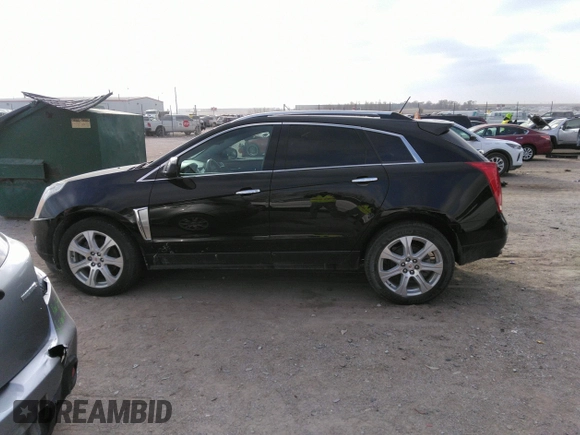 2016 Cadillac SRX Performance Collection z VIN 3GYFNCE32GS505552, wystawiony jako IAAI lot #40949642 z przebiegiem 143 343 mil mil oraz . Historia ofert i sprzedaży dostępna na DreamBid. Obrazek 14.