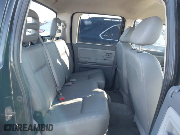 2006 Dodge Dakota SLT z VIN 1D7HW48K66S632826, wystawiony jako IAAI lot #41635407 z przebiegiem 208 046 mil mil oraz . Historia ofert i sprzedaży dostępna na DreamBid. Obrazek 8.