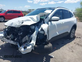 2022 Ford Escape Titanium z VIN 1FMCU9J97NUB89504, wystawiony jako IAAI lot #42571833 z przebiegiem Nie podano mil oraz . Historia ofert i sprzedaży dostępna na DreamBid. Obrazek 17.