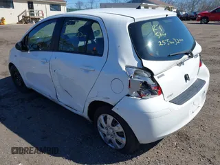 2009 Toyota Yaris with VIN JTDKT903X95244723, listed as a IAAI auction lot 41906848 with Not Provided miles. Bid and sale history available at carsss.com. Image 3.