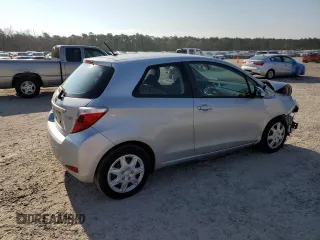 2014 Toyota Yaris L with VIN VNKJTUD30EA006137, listed as a Copart auction lot 72061304 with 104,664 mi miles and Salvage Title. Bid and sale history available at carsss.com. Image 3.