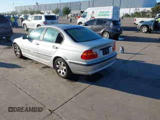 2003 BMW 3 Series 325i with VIN WBAAZ33473PH31756, listed as a IAAI auction lot 41605387 with 187,410 mi miles. Bid and sale history available at carsss.com. Image 3.