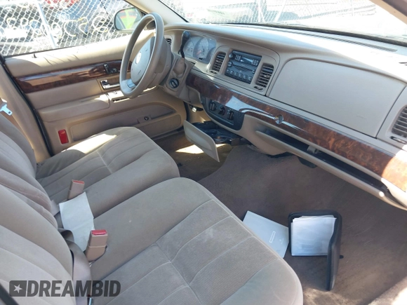 2005 Mercury Grand Marquis GS with VIN 2MEFM74WX5X614325, listed as a IAAI auction lot 41844701 with Not Provided miles and . Bid and sale history available at DreamBid. Image 5.
