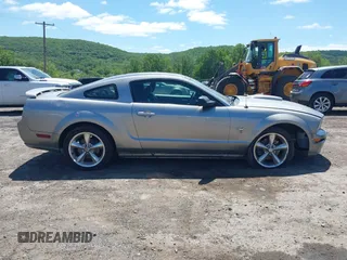 2009 Ford Mustang GT z VIN 1ZVHT82H295123520, wystawiony jako IAAI lot #42313485 z przebiegiem 153 069 mil mil oraz . Historia ofert i sprzedaży dostępna na DreamBid. Obrazek 14.