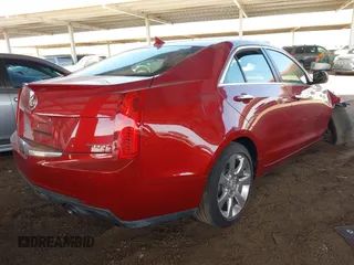 2013 Cadillac ATS Luxury with VIN 1G6AB5SX5D0145064, listed as a IAAI auction lot 41702363 with 34,031 mi miles and . Bid and sale history available at DreamBid. Image 4.