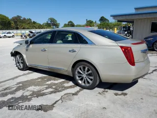 2014 Cadillac XTS with VIN 2G61L5S30E9196697, listed as a Copart auction lot 48574995 with 91,709 mi miles and Salvage Title. Bid and sale history available at carsss.com. Image 2.