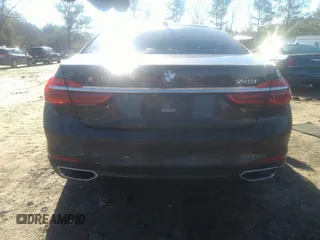 2018 BMW 7 Series 740i with VIN WBA7E2C57JG742257, listed as a IAAI auction lot 41353435 with 77,125 mi miles. Bid and sale history available at carsss.com. Image 17.