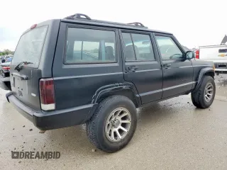 2001 Jeep Cherokee Sport with VIN 1J4FT48S41L535289, listed as a Copart auction lot 54053275 with 227,640 mi miles and Clean Title. Bid and sale history available at carsss.com. Image 4.