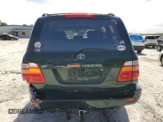 2000 Toyota Land Cruiser with VIN JT3HT05J8Y0085990, listed as a Copart auction lot 76706864 with 329,562 mi miles and Salvage Title. Bid and sale history available at carsss.com. Image 6.